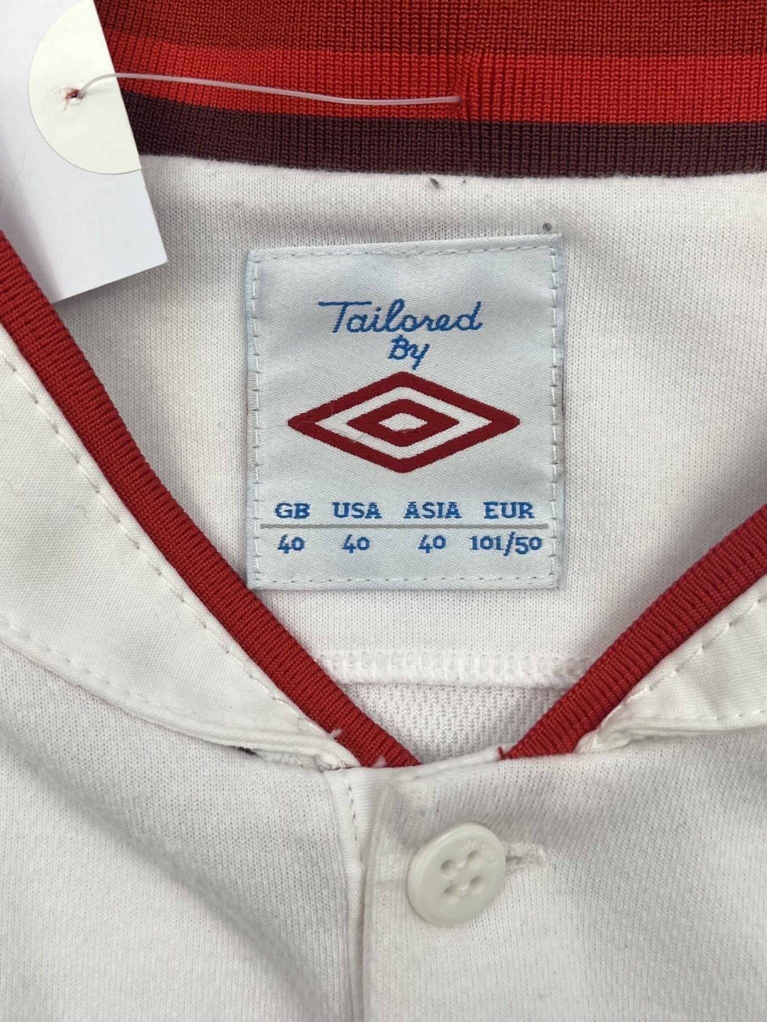 kitround vintage white Umbro England football shirt with red collar detailing and size 40 label