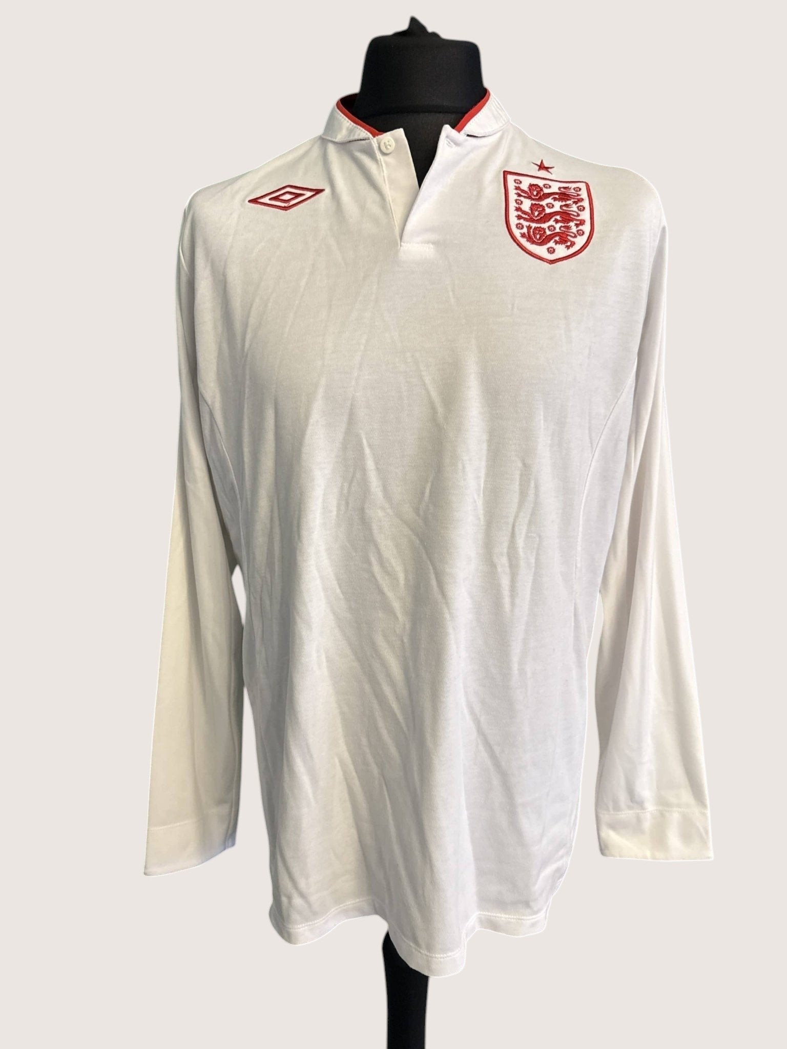 White Umbro long sleeve England football shirt with red trim and embroidered crest