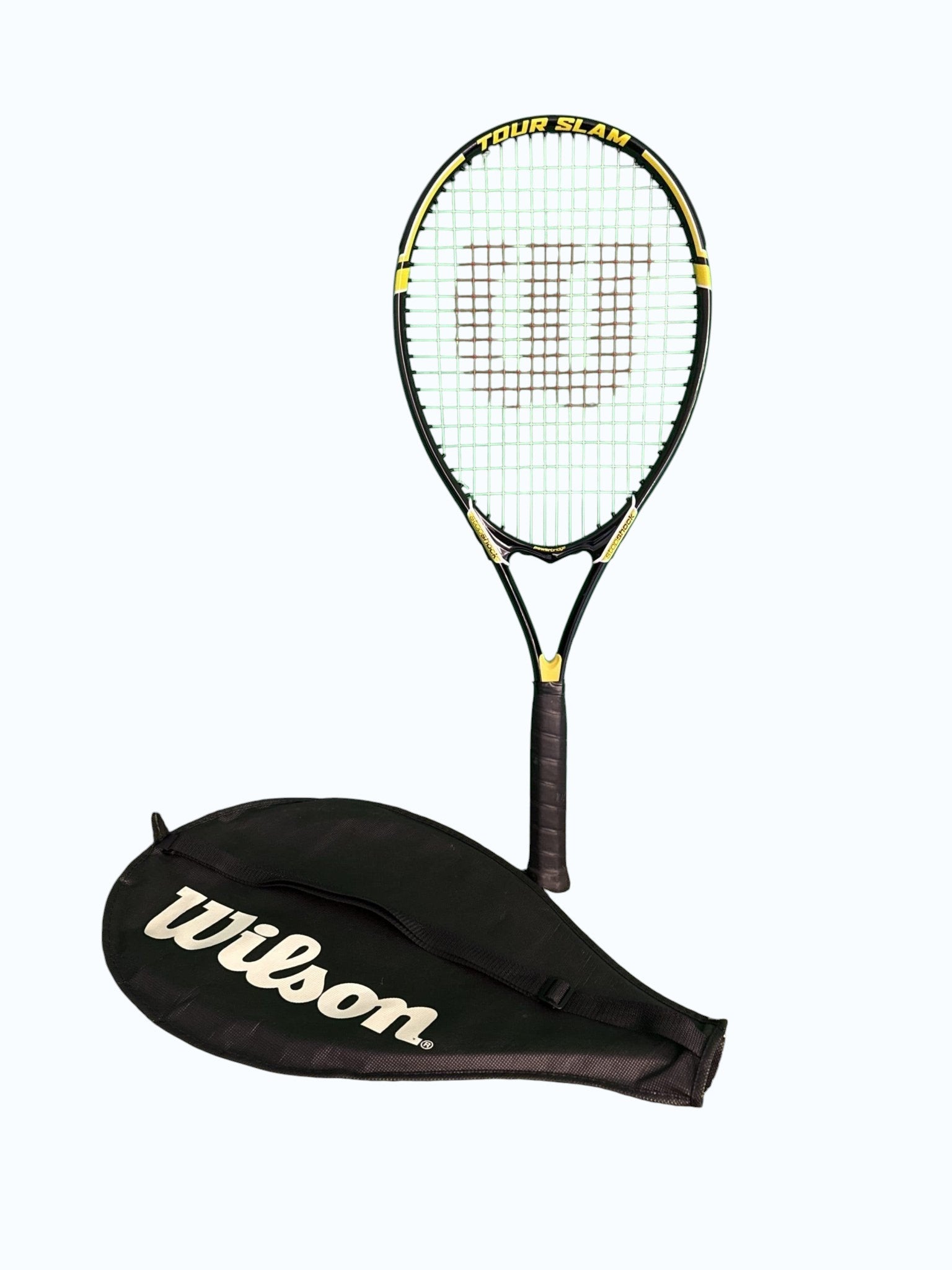 Wilson Tour Slam tennis racquet in black with yellow accents, includes black Wilson branded case. Suitable for beginners and intermediate players.