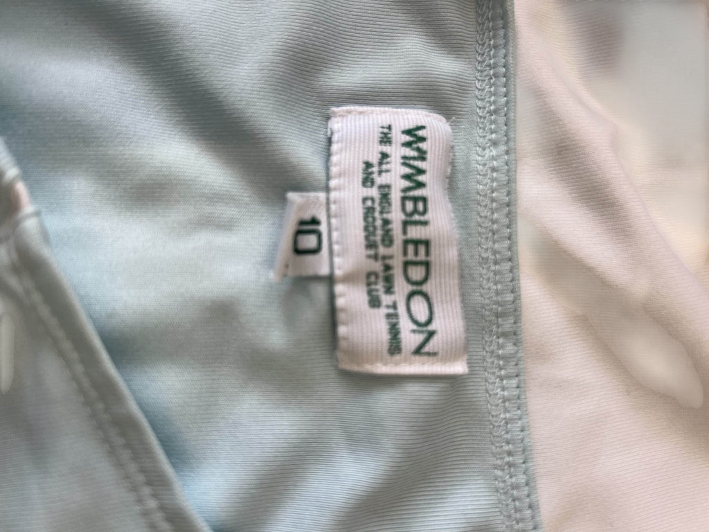 kitround aqua sleeveless Wimbledon vest for women, size 10, breathable fabric for activewear.