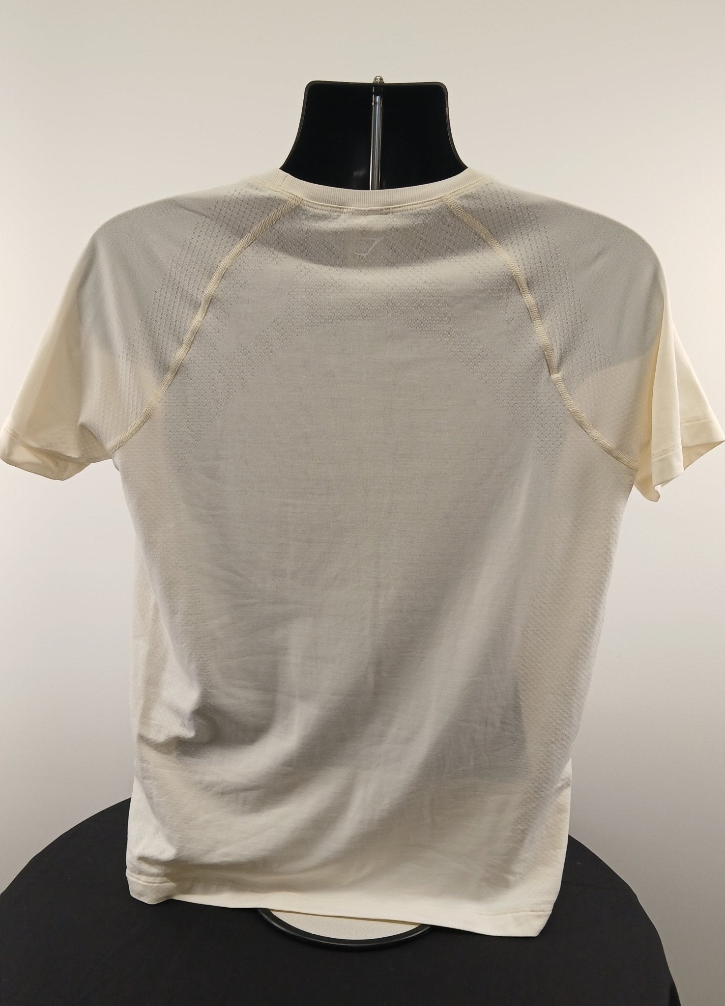Back view of lightly used white Gymshark short sleeve T-shirt size L