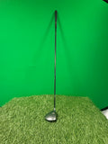 MacGregor oversize 3 wood golf club standing upright on artificial grass with green background