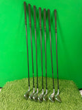 Full view of MacGregor V Foil iron set with black shafts standing in a row