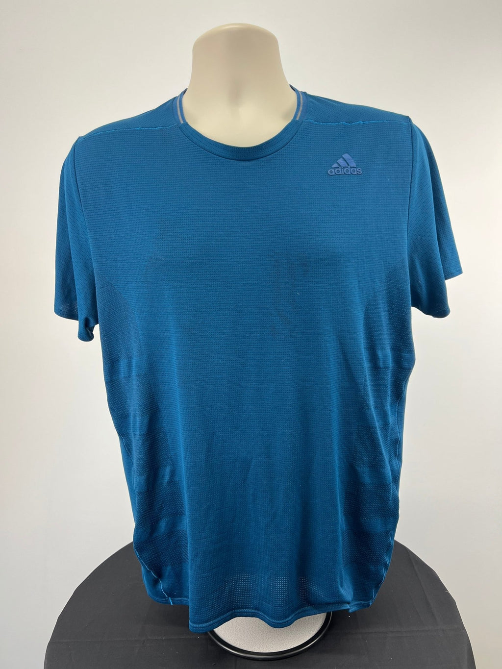 Front view of blue adidas Climacool running t-shirt size L on mannequin