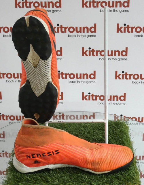 Rear side and sole view of adidas Nemesis orange astro football boots showing branding