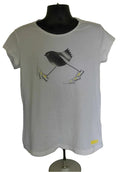 Front view of white women’s adidas T-shirt with black and grey bird graphic wearing yellow-accented trainers