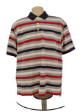 Front view of Callaway striped golf polo shirt in navy, red, and grey