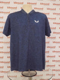 Front view of Castore blue sports top with 1/4 zip and logo