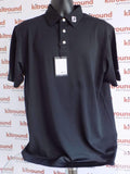 Black FootJoy golf polo shirt with FJ logo collar and DP World sleeve logo, size XL, displayed on mannequin
