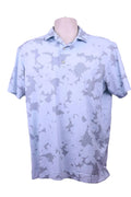 Front view of light blue FootJoy camouflage athletic fit polo shirt
