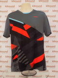 Front view of HEAD sports top with abstract print in grey, red, and blue