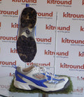 Kookaburra cricket shoe in white and blue showing spiked sole and side profile