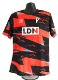Front view of EA Sports Volta FC football shirt in black and red with LDN logo