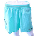 Front view of aqua Nike Aeroswift running shorts with perforated waistband