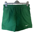 Front view of green Nike Dri-Fit sports shorts with logos