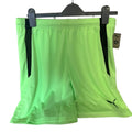 Puma teamLIGA sports shorts in fizzy lime with black side panels, displayed on hanger
