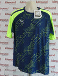 Front view of Puma Drycell sports top in neon yellow and blue geometric design size XL