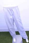 Front view of light grey Slazenger tracksuit bottoms 