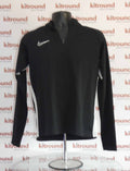 Black Nike Dri-FIT long sleeve sports top on mannequin with quarter zip