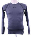Front view of Under Armour grey long-sleeved compression top on mannequin