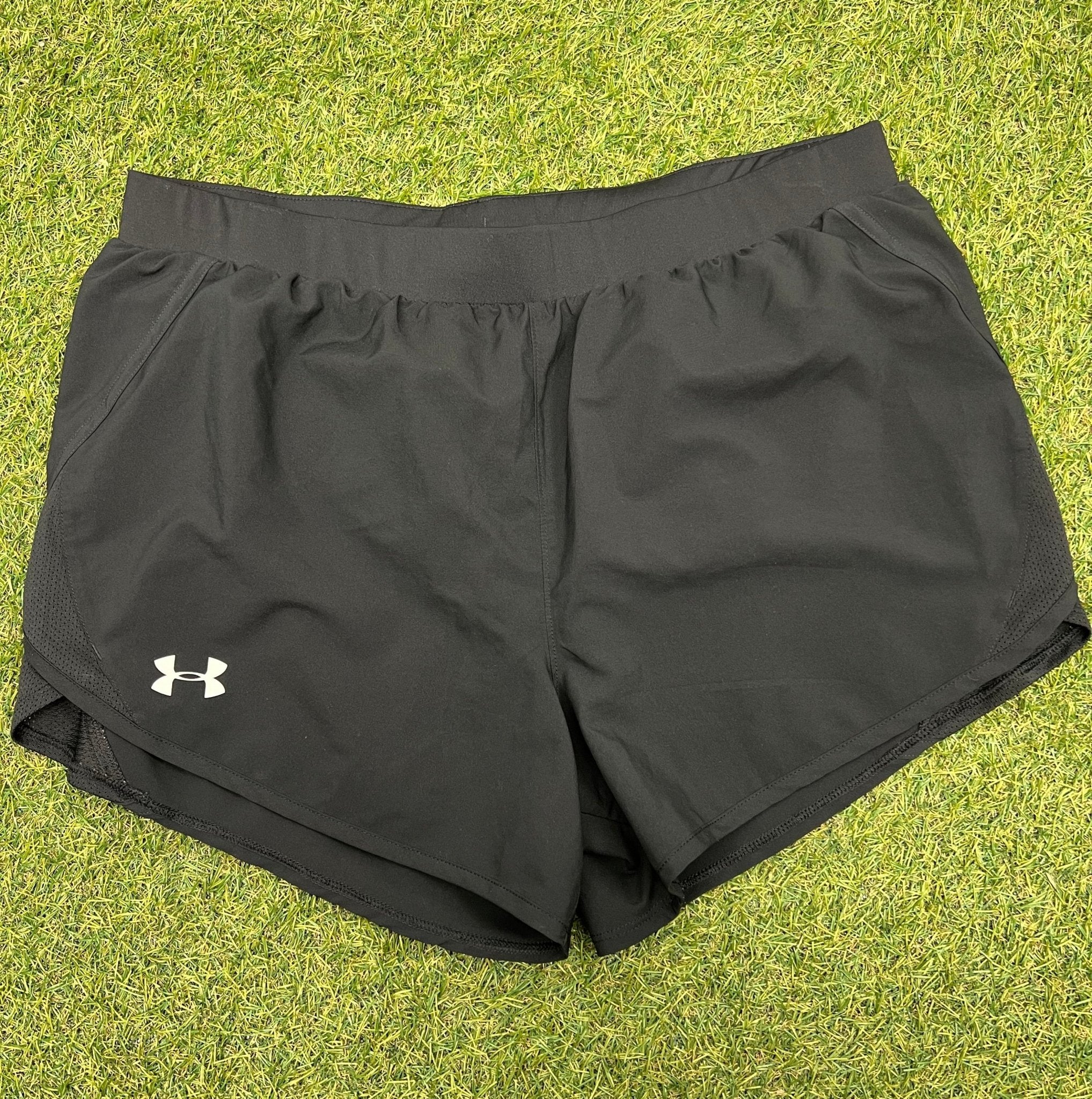 Front view of Men's Under Armour loose fit black running shorts size large