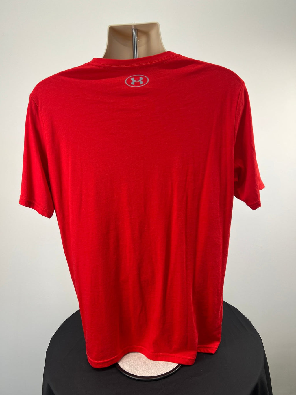 Back of red Under Armour t-shirt