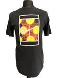 Nike black t-shirt with bright yellow and red graphic print and white frame detail on the back