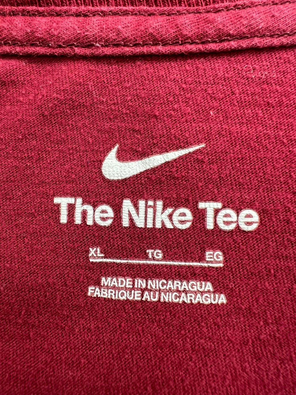Close-up of inside label showing Nike branding and XL size