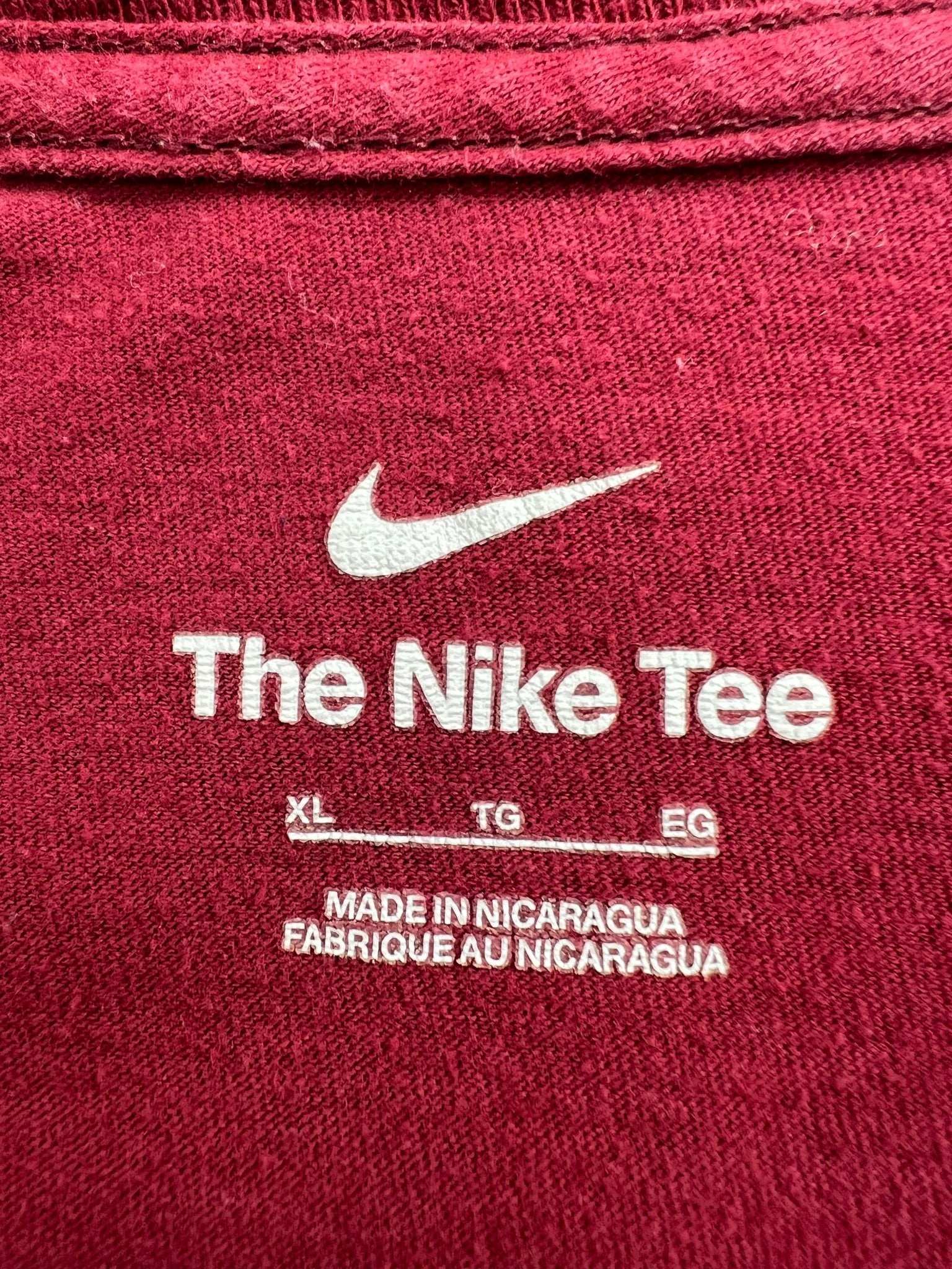 Close-up of inside label showing Nike branding and XL size