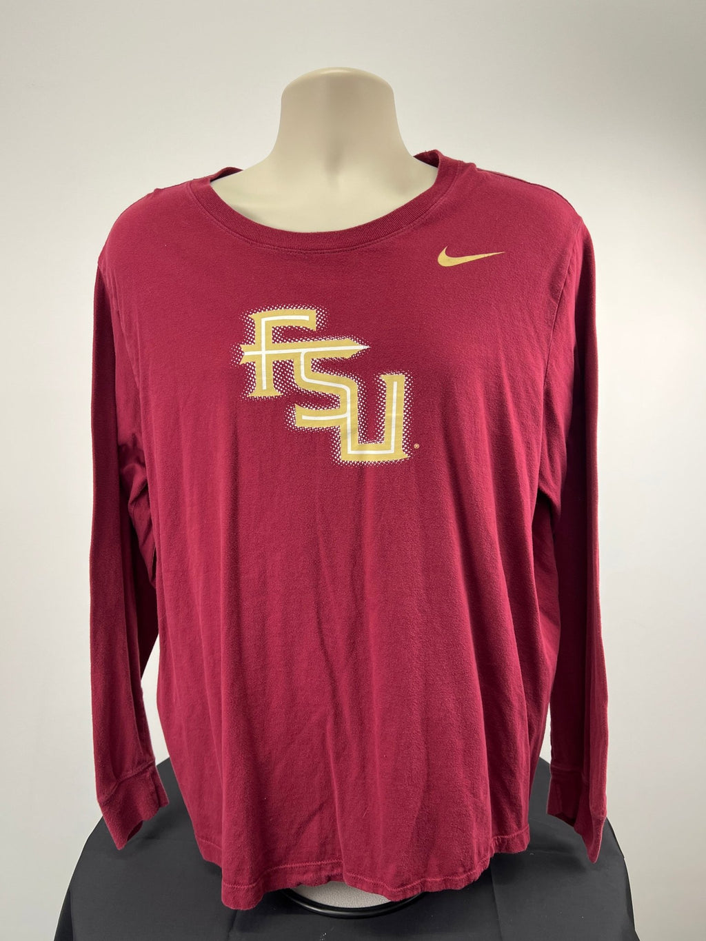 Front view of Nike burgundy long sleeve top XL with FSU logo