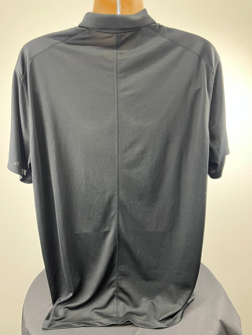 Back view of Nike black short sleeve polo shirt in XL