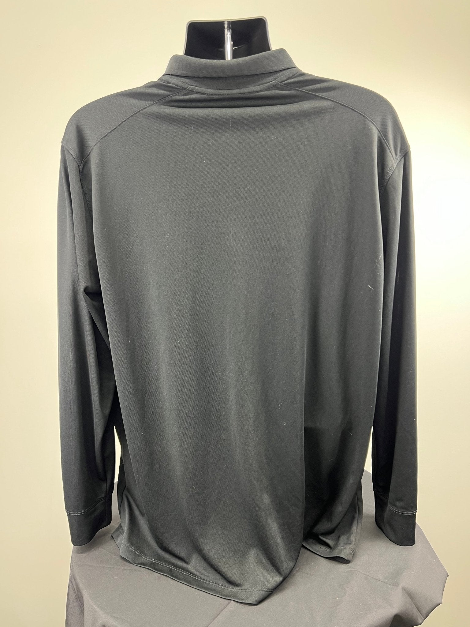 Back view of black Nike long sleeve polo shirt, XL