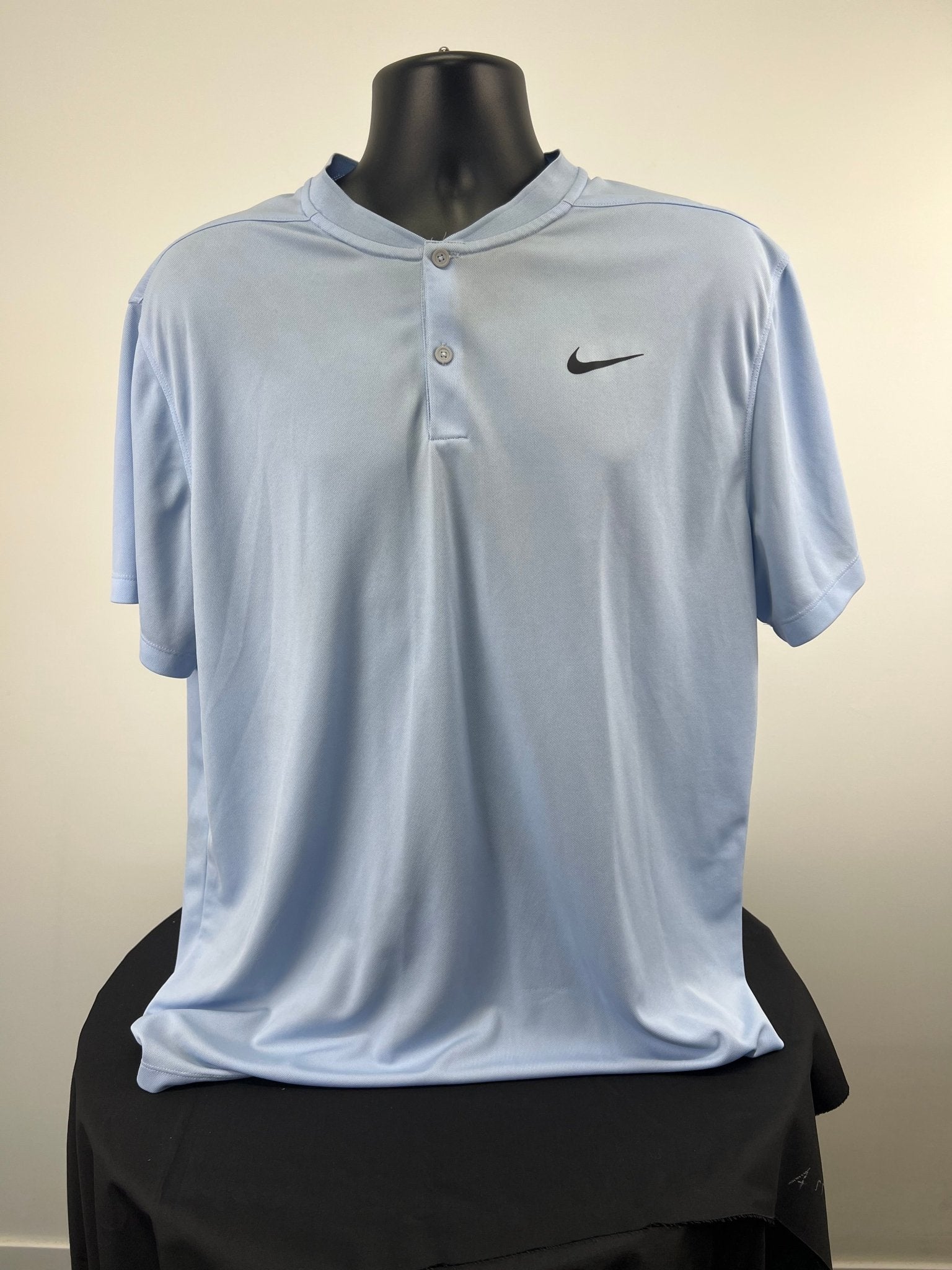 Front view of light blue Nike Dri-FIT men's button henley t-shirt XL