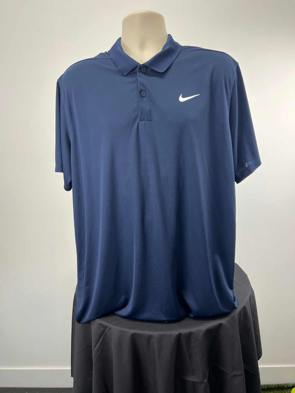 Front view of Nike Dri-FIT navy blue short sleeve polo shirt XL