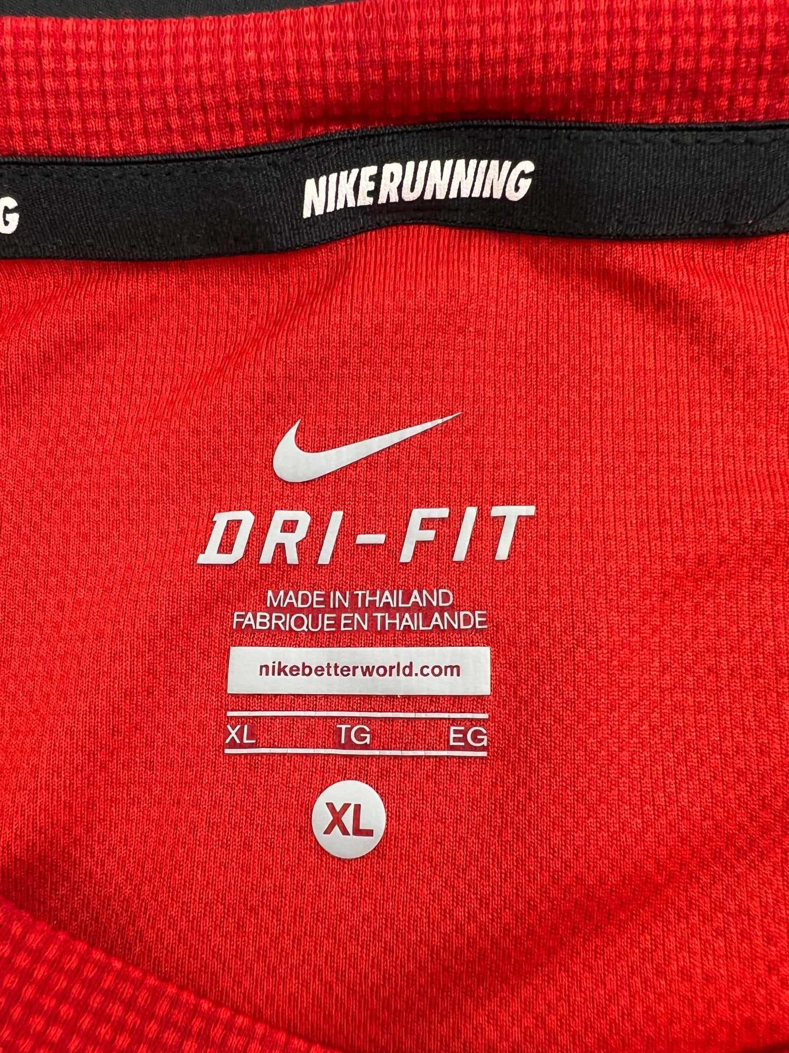 Close-up of Nike Dri-FIT label and details inside collar of shirt