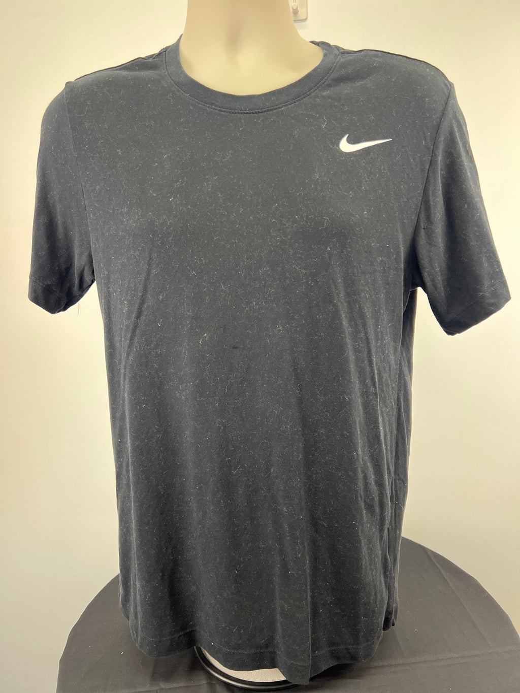 Front view of a black Nike Dri-FIT t-shirt size small with white Swoosh logo