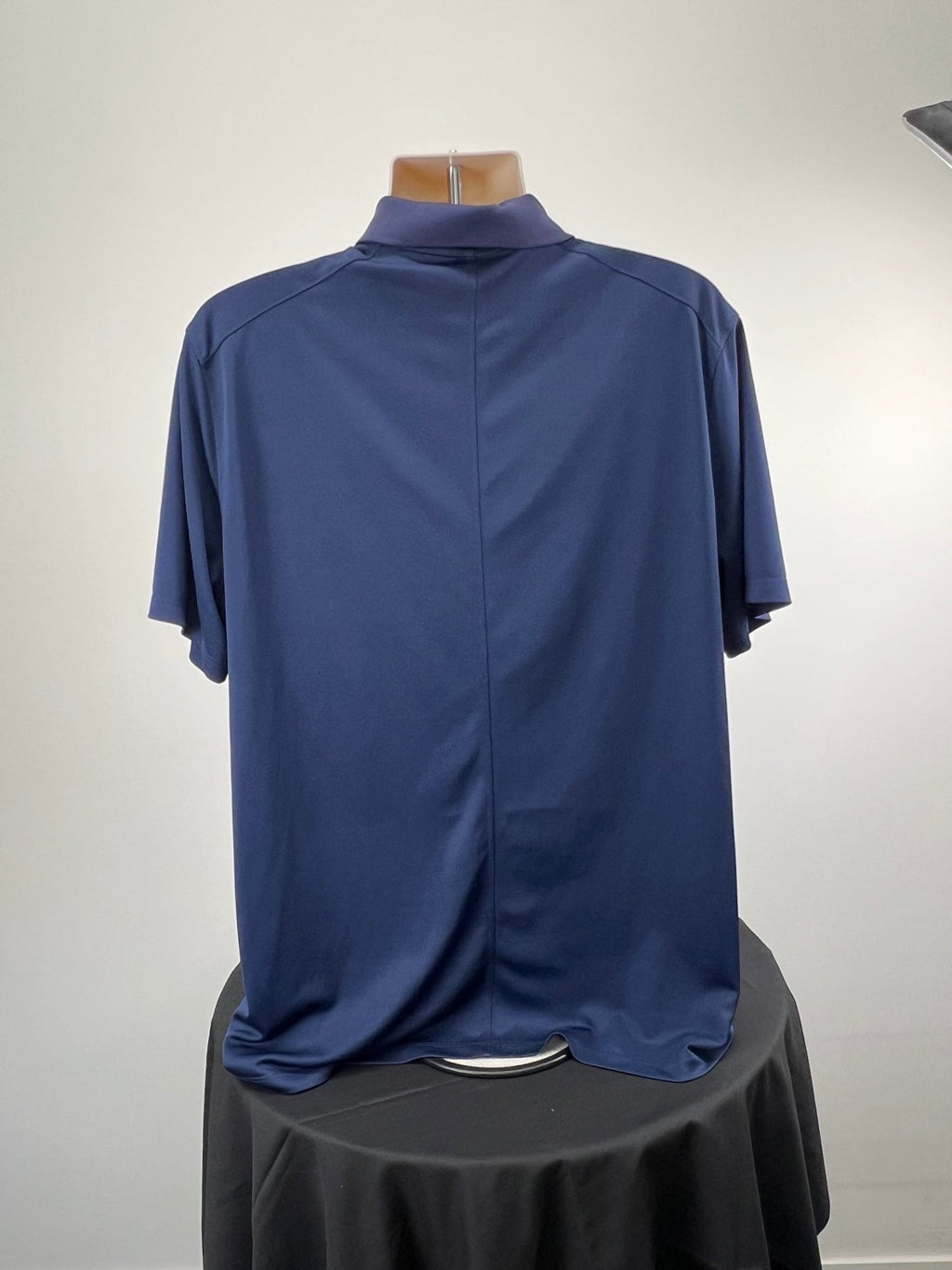 Back view of navy blue Nike Golf short sleeve Dri-FIT polo shirt, XL