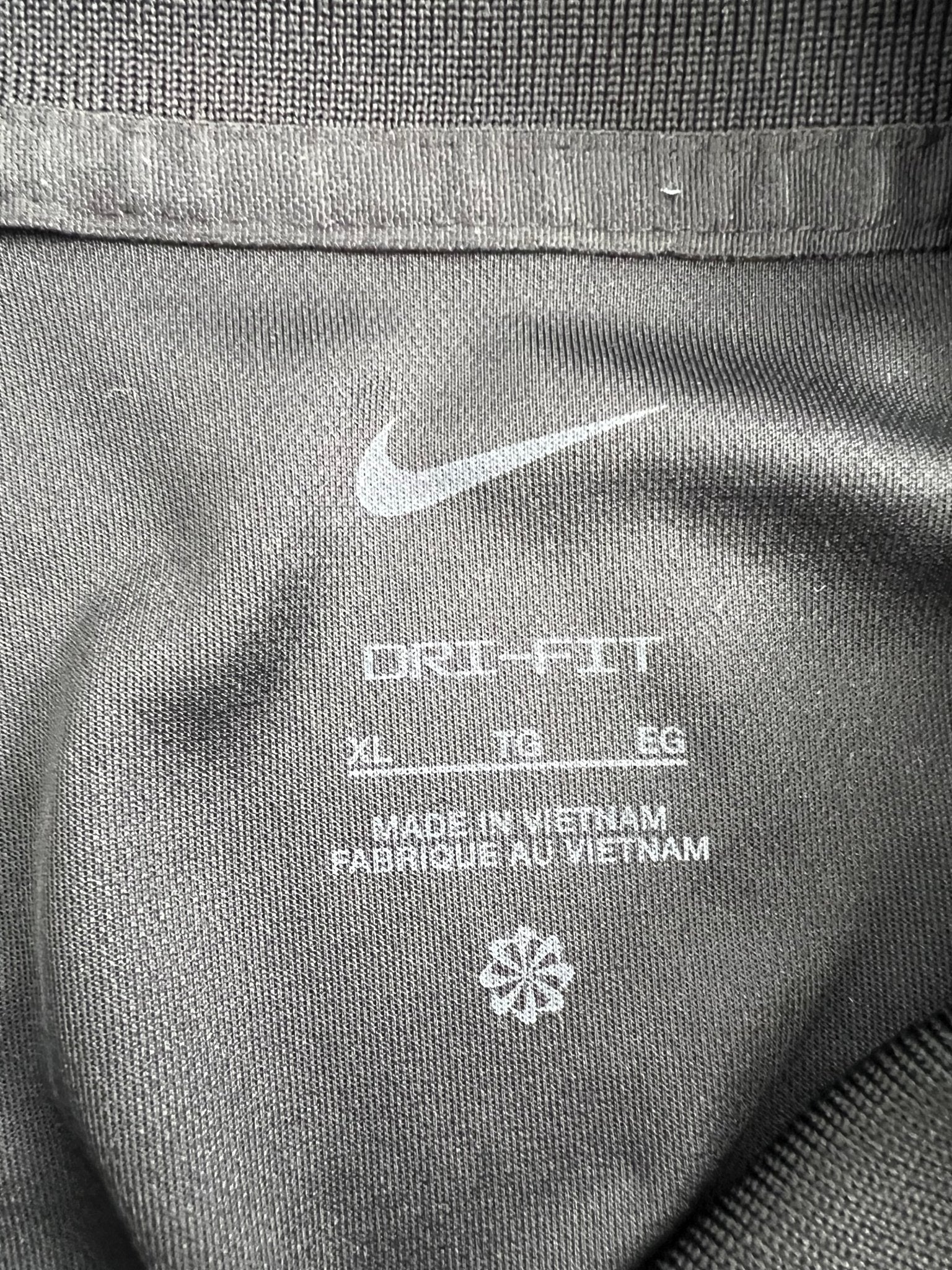 Close-up of the interior label showing Nike Dri-FIT XL details