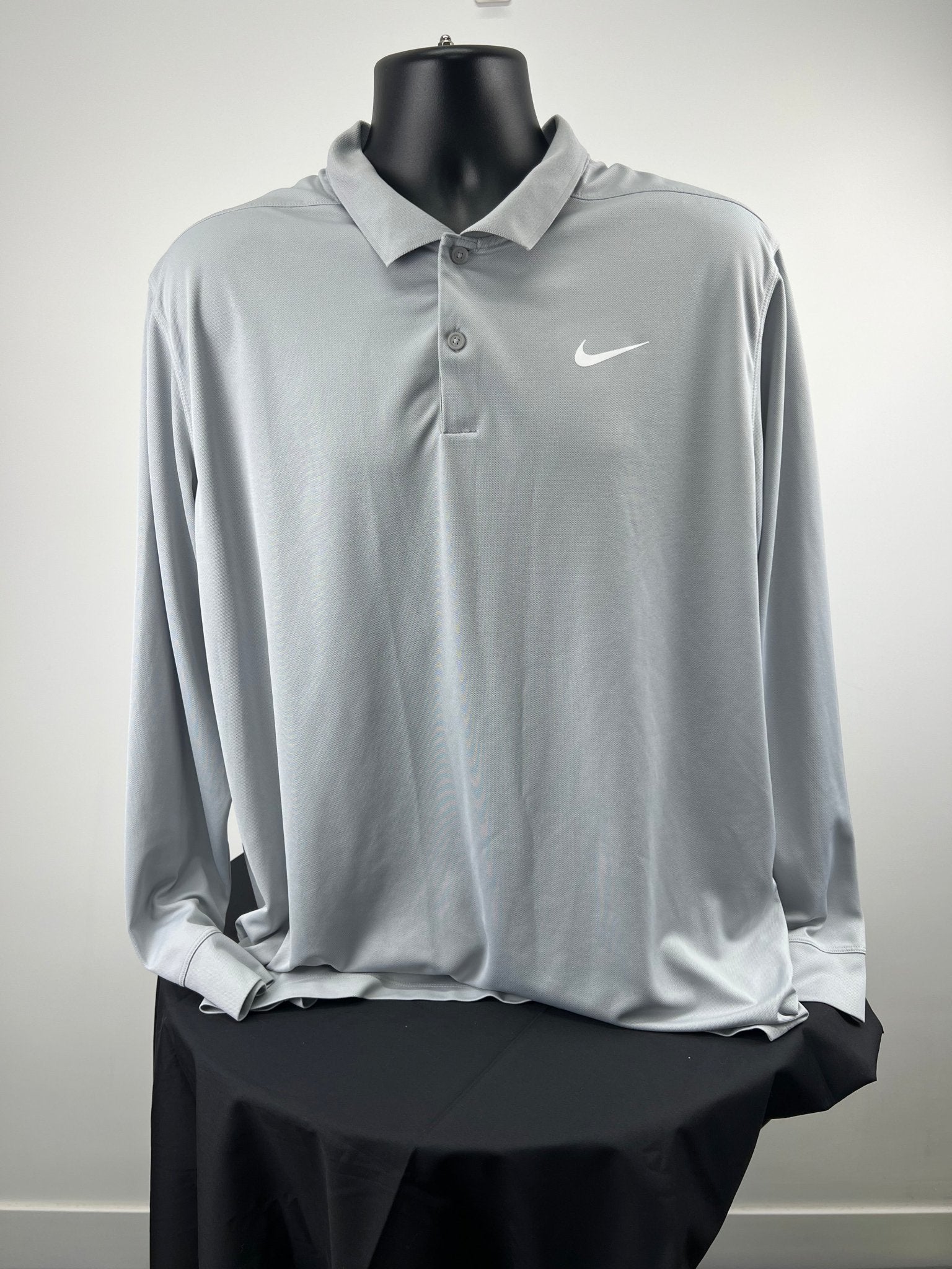 Front view of light grey Nike men's Dri-FIT long sleeve polo in XL