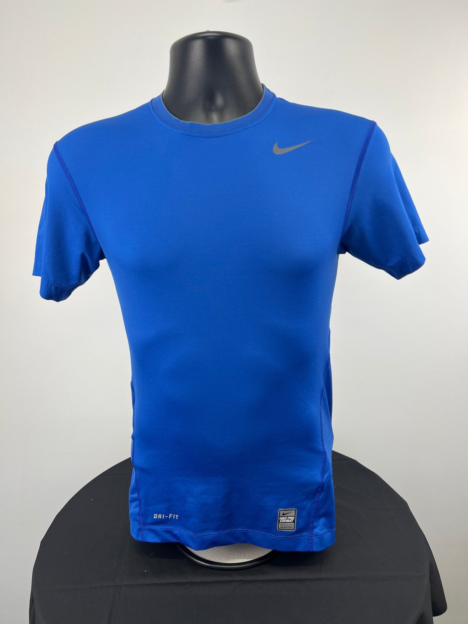 Front view of blue Nike Pro Combat Dri-FIT compression t-shirt in medium size