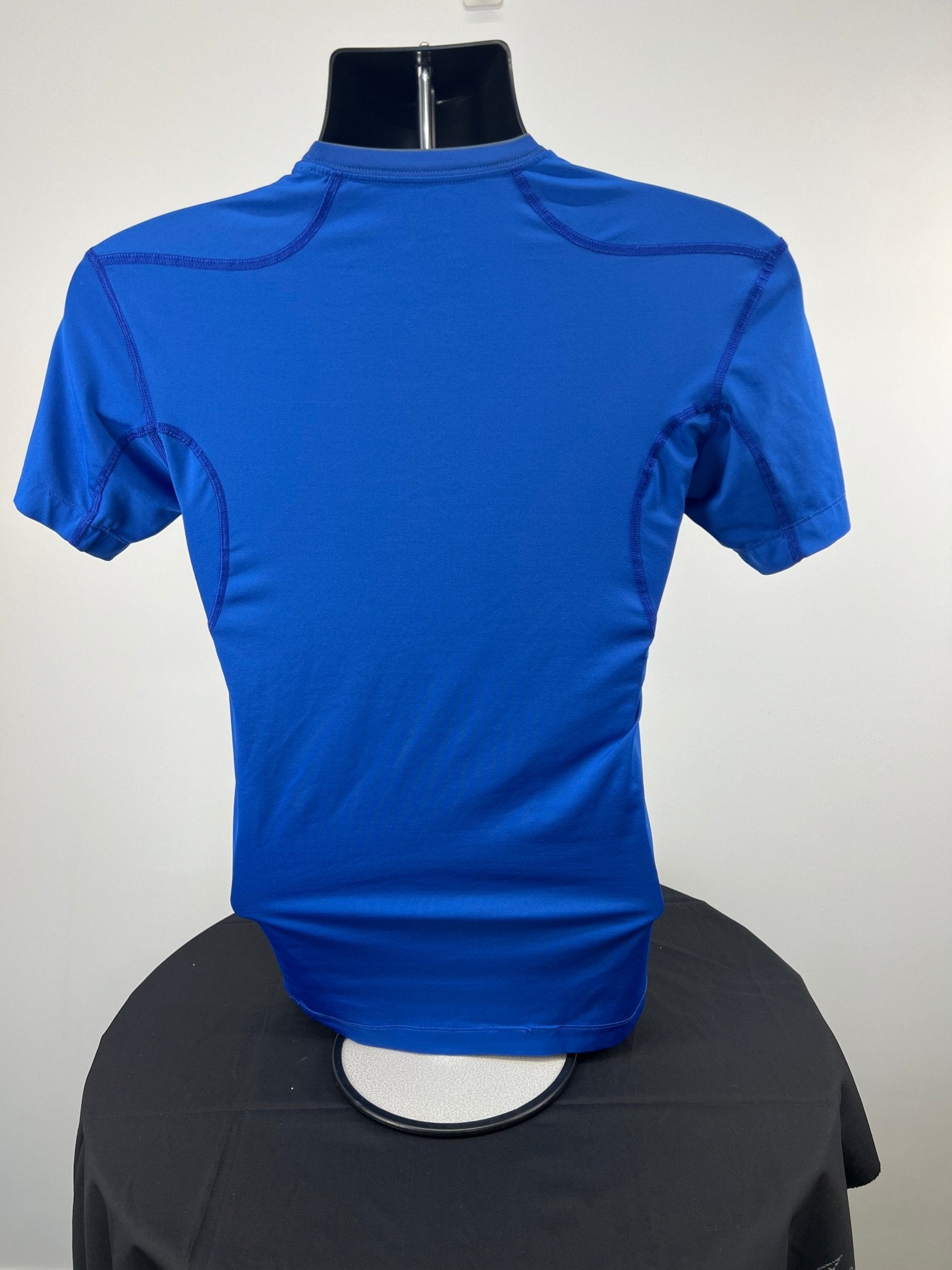 Back view of blue Nike Pro Combat Dri-FIT compression t-shirt in medium size
