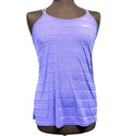 Front view of a purple Nike athletic vest with thin straps and subtle stripes displayed on a mannequin