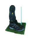 Pair of black DLX men's hiking boots with rugged outsoles on a grass mat