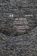 Close-up of grey Under Armour tech tee label