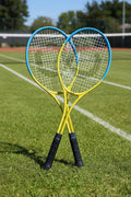 Pair of blue and yellow Opti tennis racquets standing on a grass tennis court