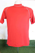 Red Proact rash top with contrast stitching, back view