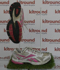 White and pink Reebok trainers, one side view and one sole view