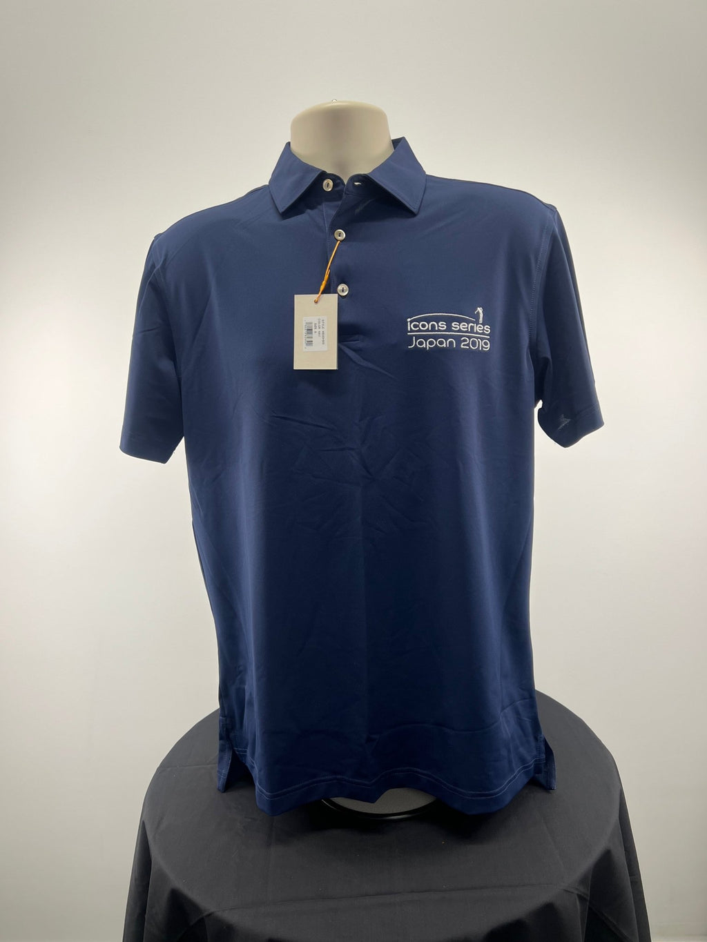 Front view of Peter Millar Icon Series Japan 2019 navy polo, size medium