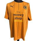 Front of Puma Wolves football shirt in bright orange with black pinstripes, sponsor and club crest visible