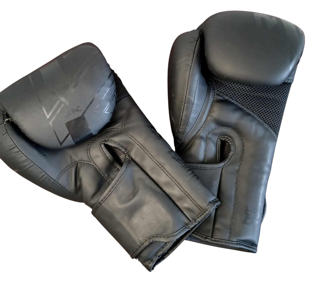 RDX black synthetic boxing gloves, 14 oz, with velcro closure for training and sparring.
